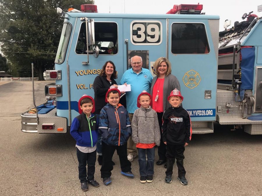 A+donation+was+presented+to+Chief+Barry+Banker+by+Jackie+Elliot%2C+Co-Chair+of+the+treat+sale%0Acommittee+and+principal+Kim+Stewart.+Kindergarten+students+include%3A+Michael+Molina%2C+Joey%0AOlenchack%2C+Mason+Elliot+and+Anders+Cirota.