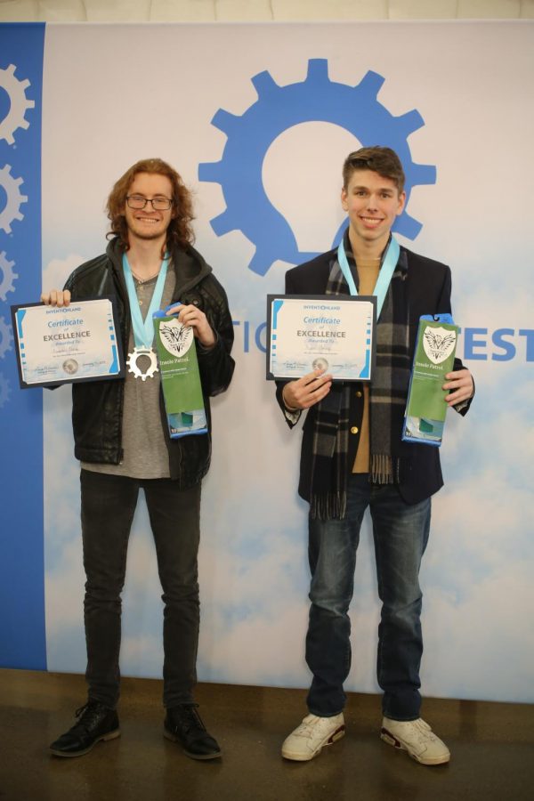 Alex Petrie (left) and Ryan Young (right) with their winning  product Insole Patrol.