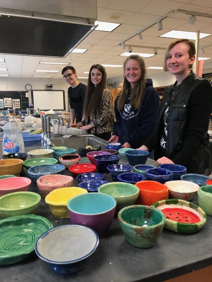National Art Honor Society members package up the bowls for the Empty Bowl event held at Hempfield High School each year.