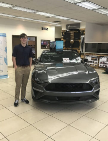 Senior, Cam Rohrer, interns at Smail Auto Group working in finance.