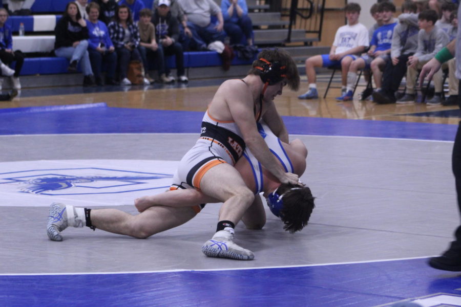 Brock Mears trying to set up a pin in his match at Connellsville.