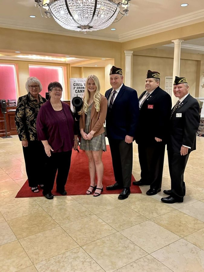 Gabi Standing Proud with State and District VFW Commanders and Auxiliary Commanders