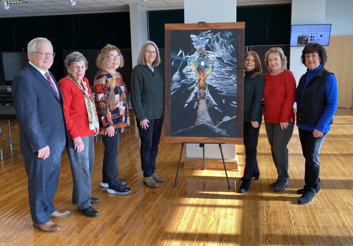 L-R: GLSD Art Conservation Trust’s Keith Visconti and Barbara Nakles along with members of the class of
1972 Tracey McCarthy Downs, Patty Moore McDonough, Debra Rullo Bumar, Ruth Lantzy Menoher and Maria
Battaglia Peluso presented the painting Light Overcoming by Rachel Dawn Kling.