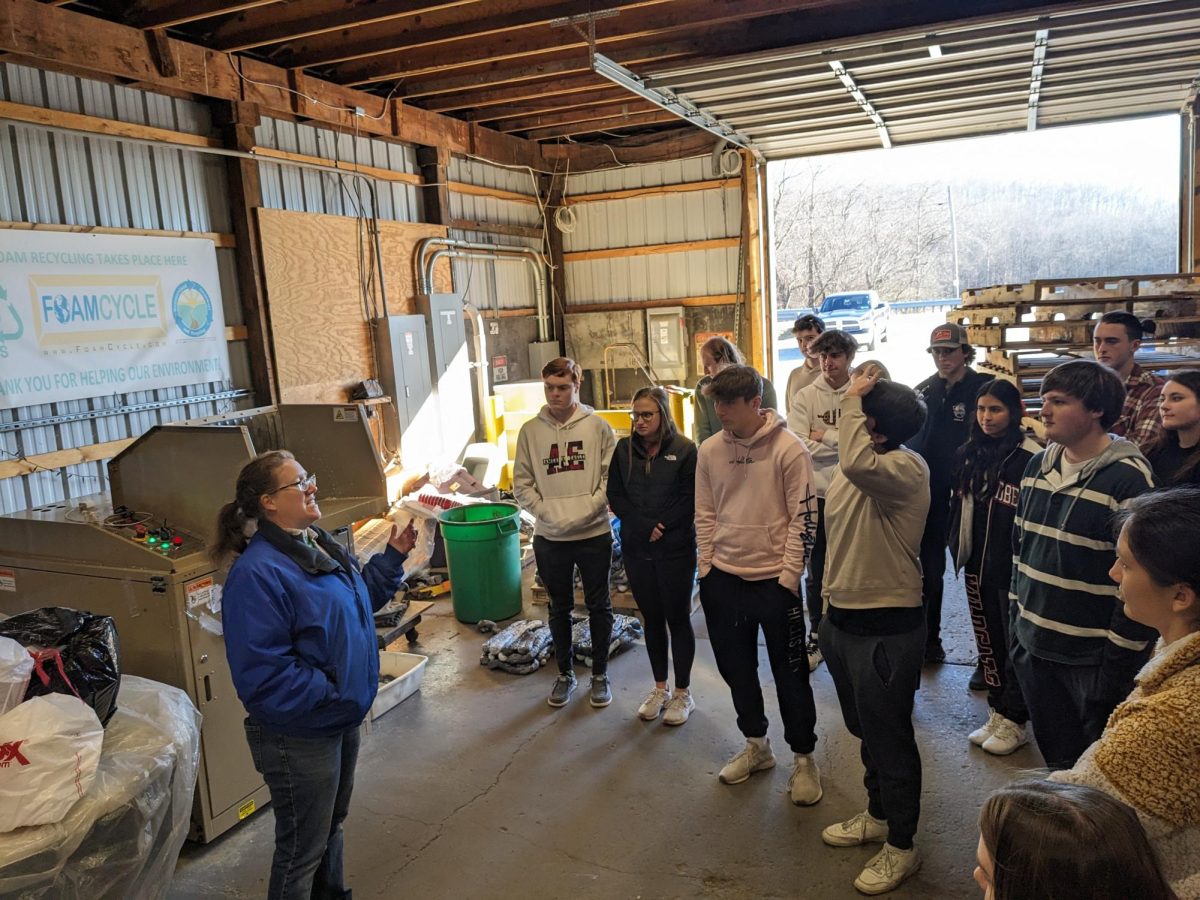 Capstone students listen to Natalie Reese on their tour of the Westmoreland Cleanways Recycling Center.