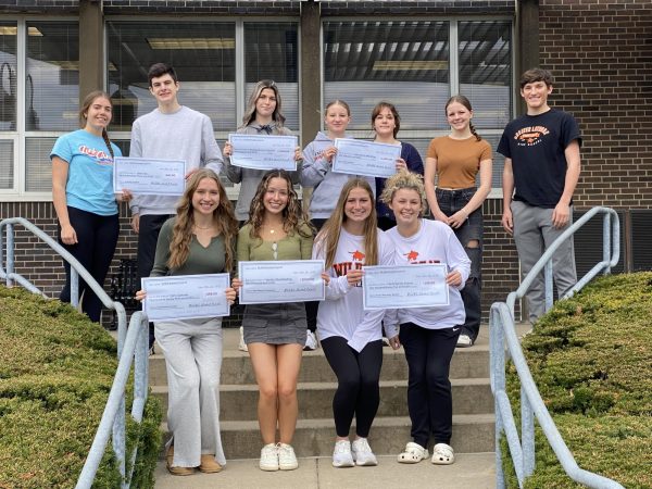 Photo 1: First Row: Jaycee Bodnar, Cat’s Customs (sublimation printer); Sophia Bulava, Varsity Cheerleading (new mascot costume); Annalyse Bauer and Mackenzie Kubistek, Girls Varsity Soccer (foam recovery rollers); Second Row: Violet Deist and Tyler Bauer, Link Crew (follow-up freshman activities); Brianna Vesely, Broadcast and Video Production (Sony 4K cameras); Liz Wilson and Elizabeth Kantoris, Girls Varsity Wrestling (new uniforms); Matilda Price, Student Council vice president; Luke Bulebosh, Student Council treasurer